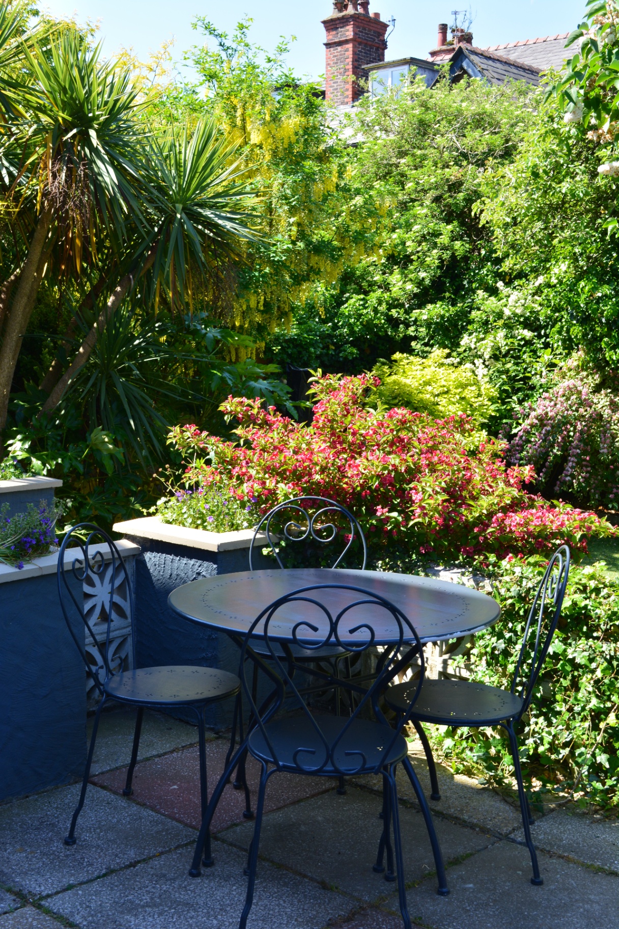 Private garden patio with seating