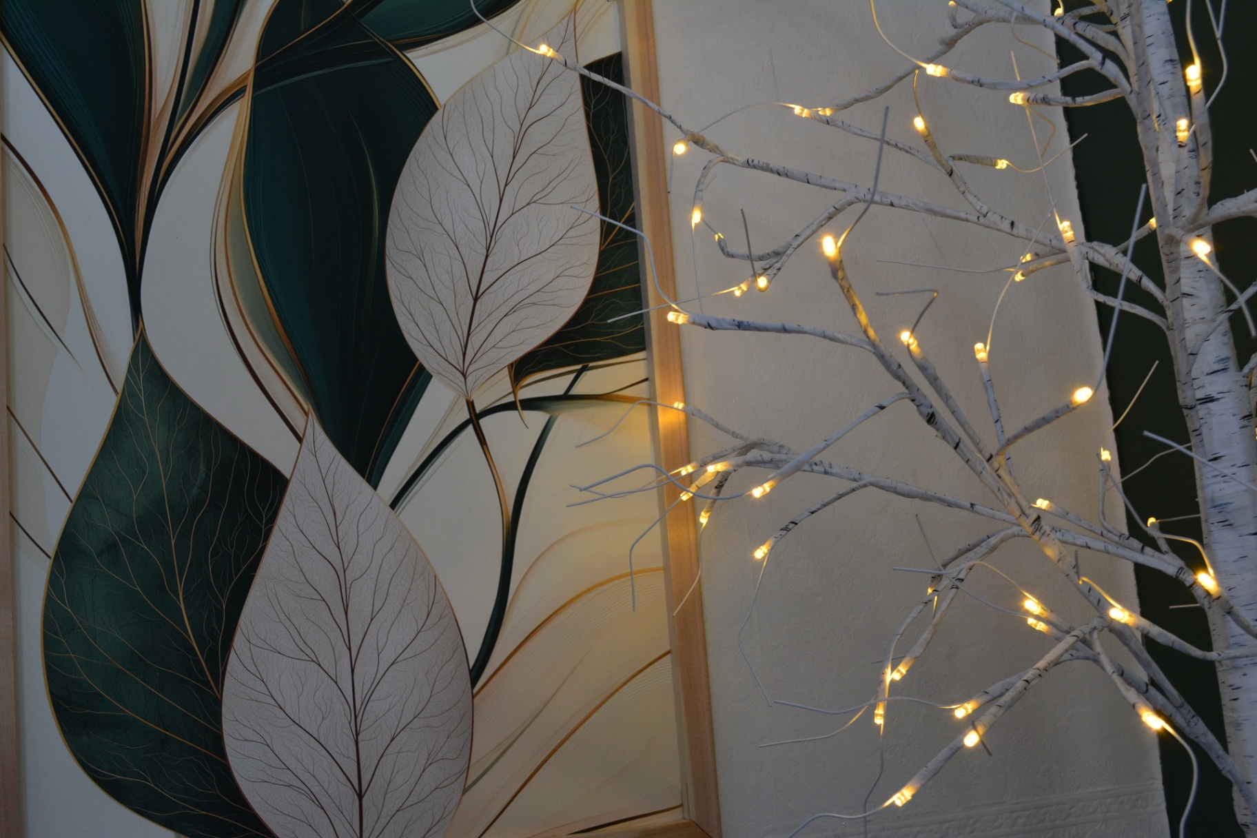 Botanical wall art and warm lighting
